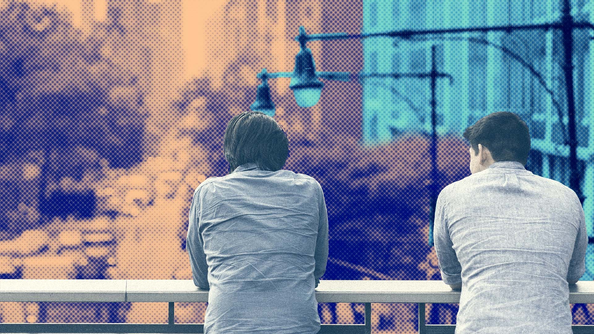 Two people in discussion on Columbia's campus